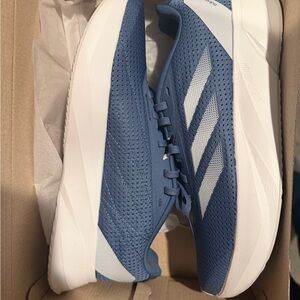 Adidas Duramo SL Light Blue Running Sneakers with White Stripes